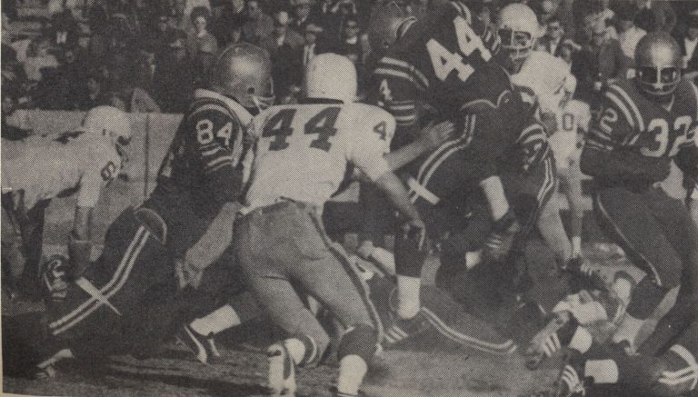 1968 Estacado Matadors Football tailback Larry Miller, number 44, in action against Henderson, from the Estacado Echo