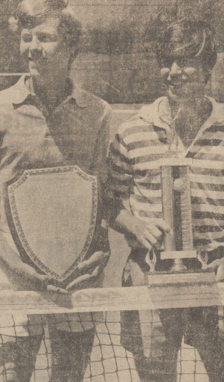 1975 Coronado 4A State Champion Boys Doubles Tennis Team: Doug Davis and Charles Key with a shield plaque and trophy
