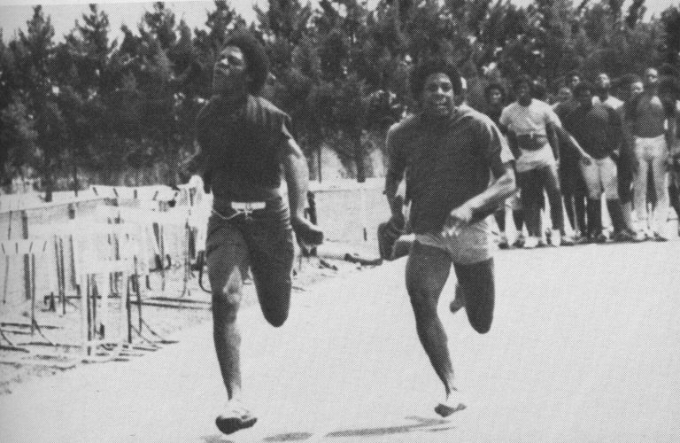 1983 Estacado High School Boys Track and Field State Champions runners Henry Alsbrooks and Dion Green racing in practice