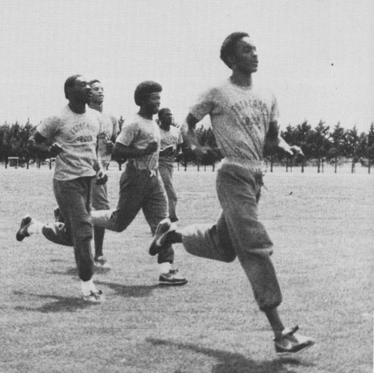 1983 Estacado High School Boys Track and Field State Champions varsity runners practicing for the regional meet
