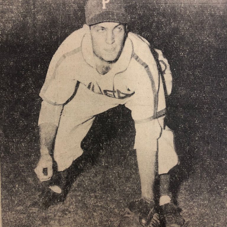 Bobby Brown in a Pampa baseball uniform crouched in a fielding stance, vintage print