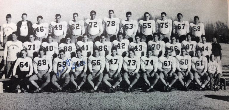 Bobby Brown with the Westerner Squad '49 football team in a black-and-white team photo