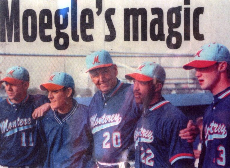 Bobby Moegle with four baseball players in M caps under the newspaper headline Moegle's magic