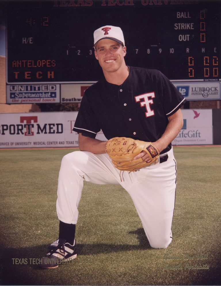 Brad Ralston posing on one knee in a Texas Tech baseball uniform with a glove