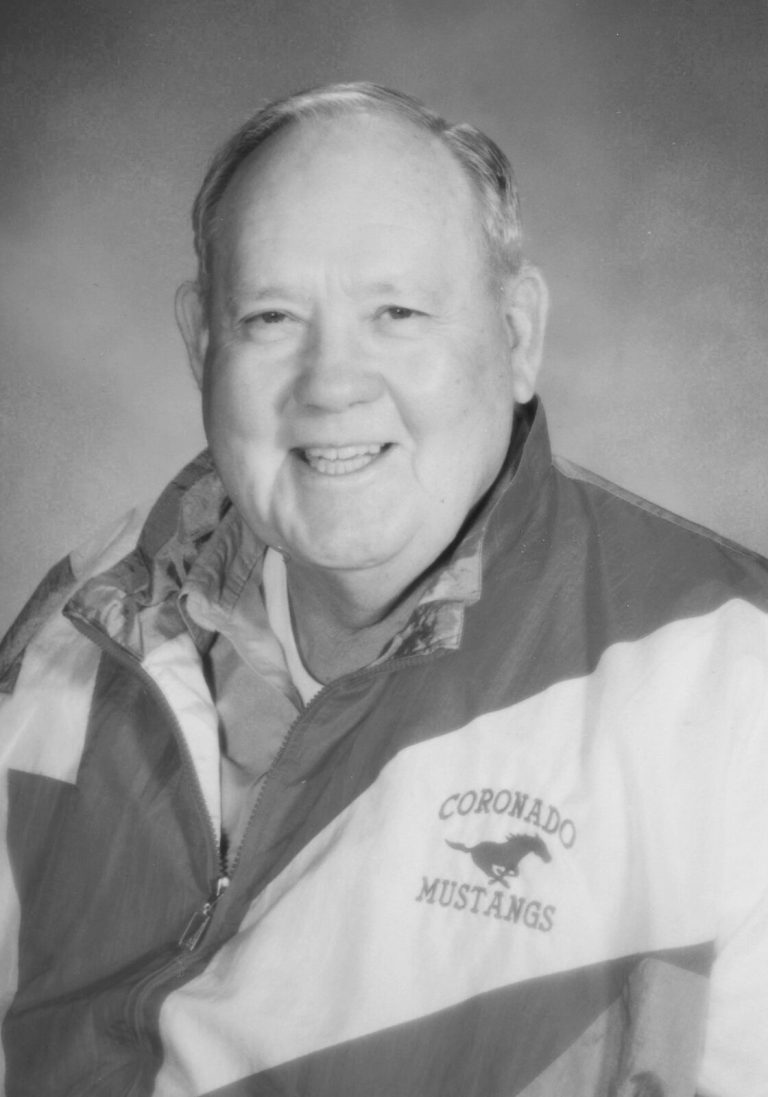 Cal Lowry in a Coronado Mustangs jacket, black-and-white portrait