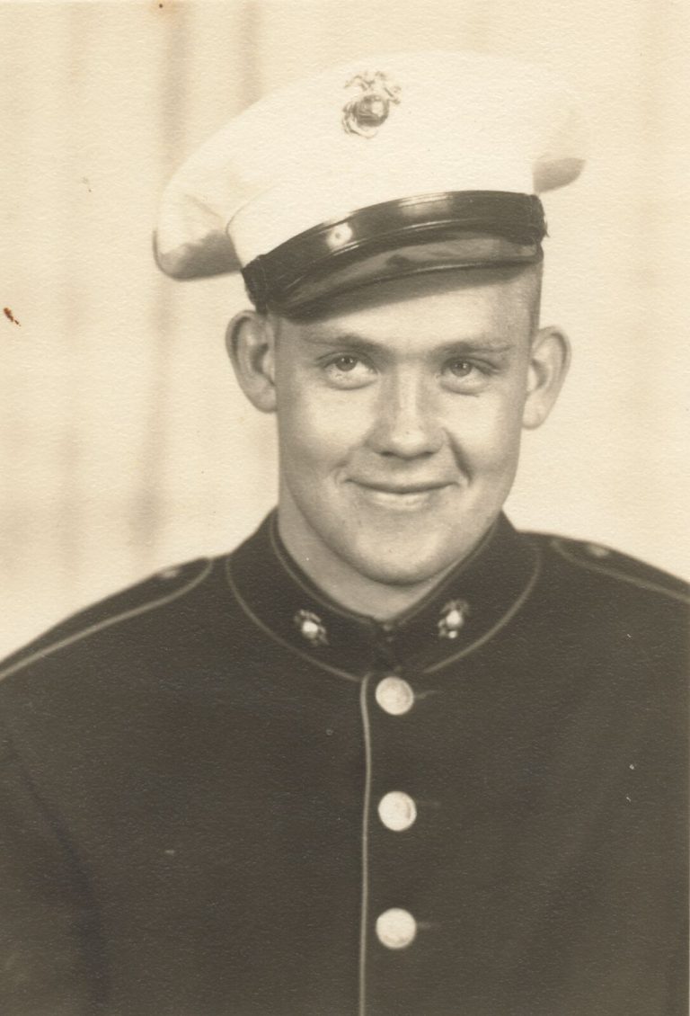 Cal Lowry in a Marine dress uniform and white cap, vintage sepia portrait