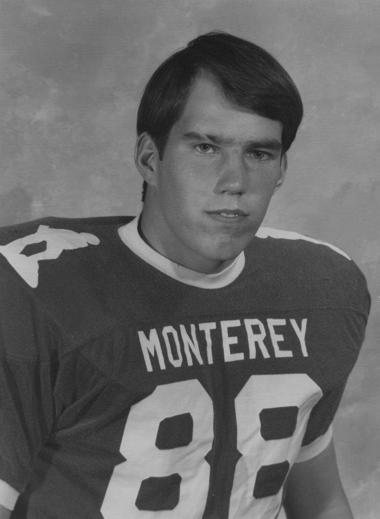 Dan Irons in a Monterey No. 88 football jersey, studio portrait