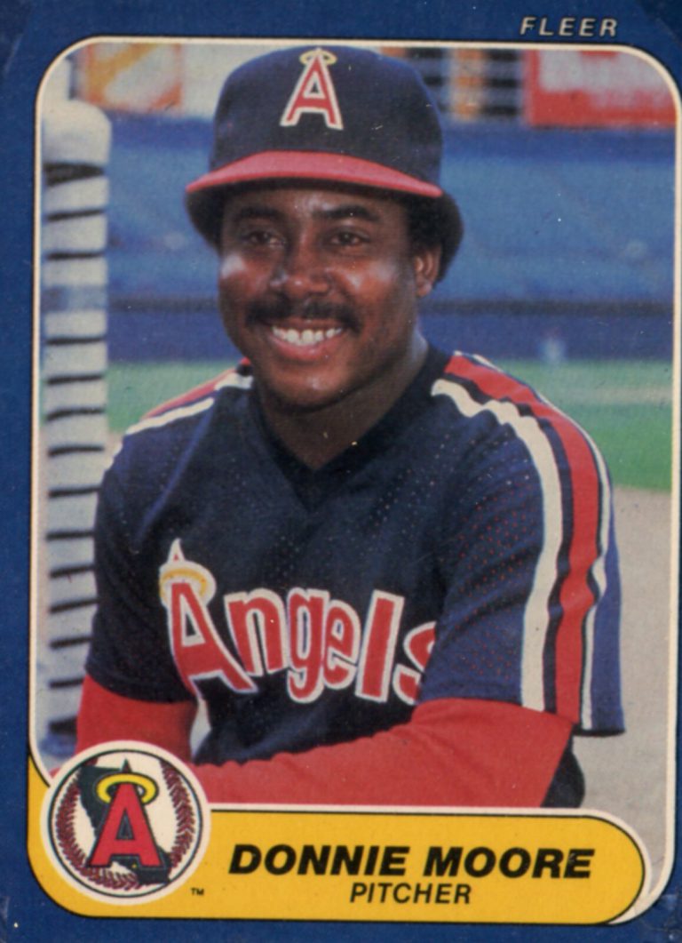 Donnie Moore smiling in an Angels cap and navy jersey on a Fleer baseball card