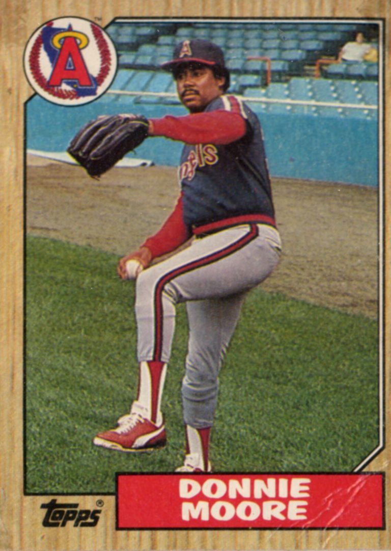 Donnie Moore in a leg-kick pitching delivery for the Angels on a Topps baseball card