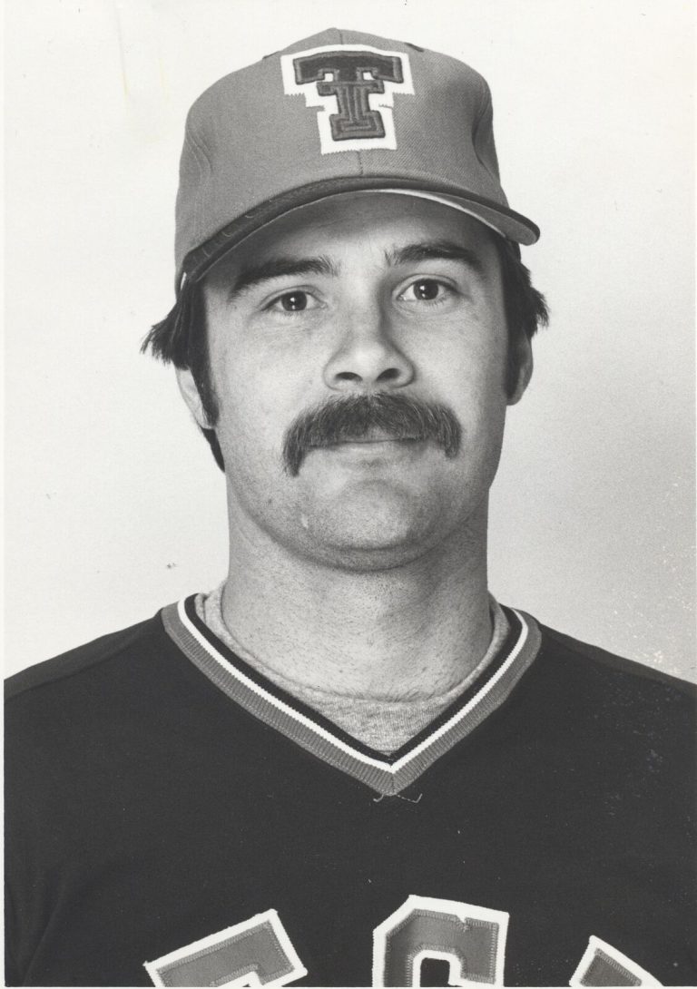 Gary Ashby in a Texas Tech baseball cap and dark jersey, black-and-white portrait