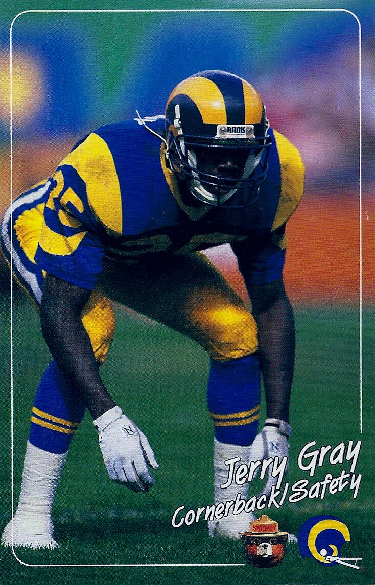 Jerry Gray crouched in a blue and gold Los Angeles Rams uniform on a Cornerback/Safety card with a Smokey Bear logo