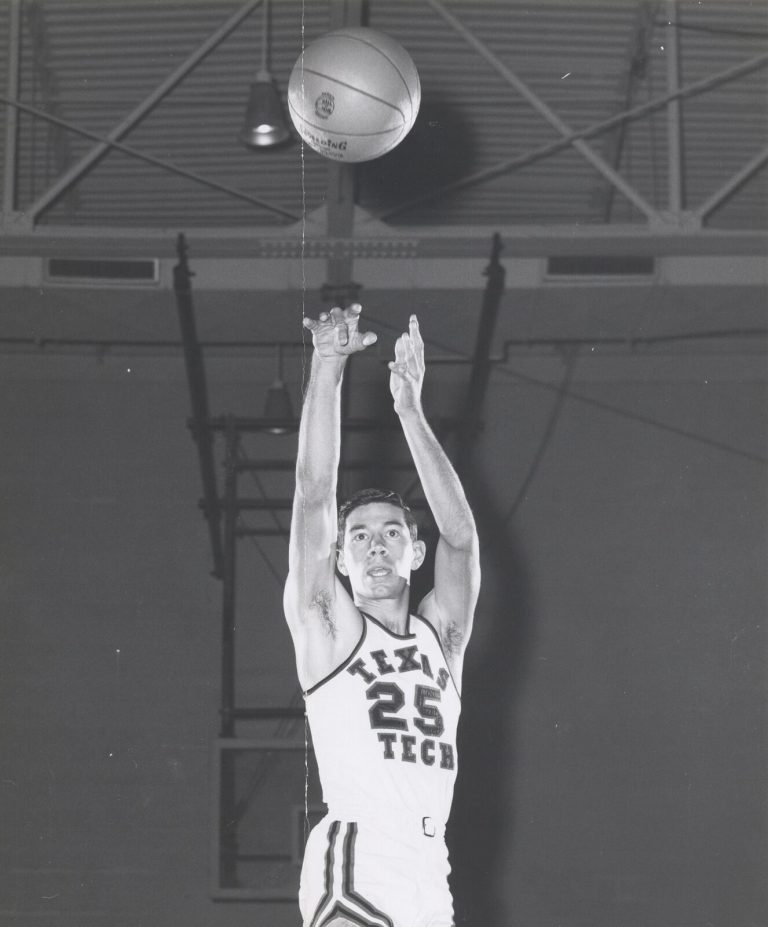 Jerry Haggard shooting the ball in a Texas Tech number 25 jersey, black and white