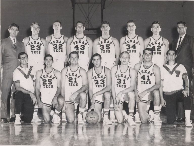 Jerry Haggard with the Texas Tech basketball team and coaches in a black-and-white team photo