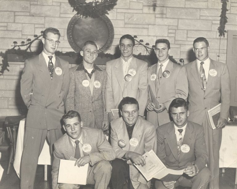 Jimmy Gafford (front row, center) with seven other 1951 All District honorees wearing badges