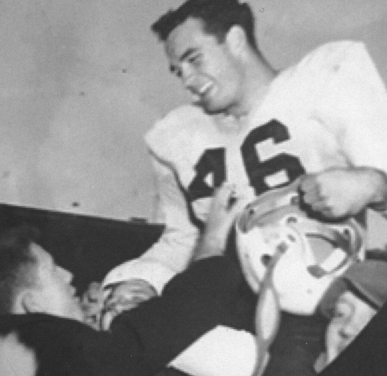 Jimmy Welch, No. 46, smiling with a helmet in hand, from a 1952 Westerners yearbook cover