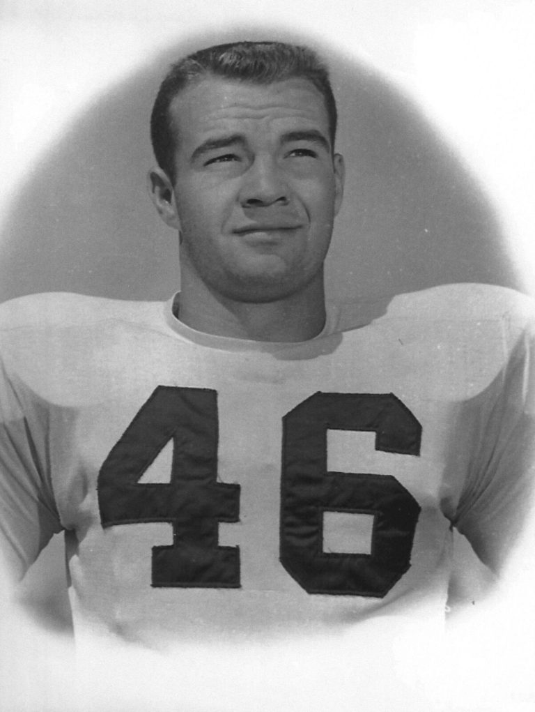 Jimmy Welch in a No. 46 football jersey, black-and-white studio portrait