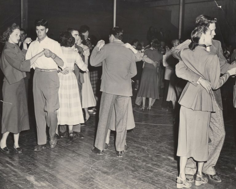 Couples dancing at a crowded dance hall, from the John Cardinal family photos