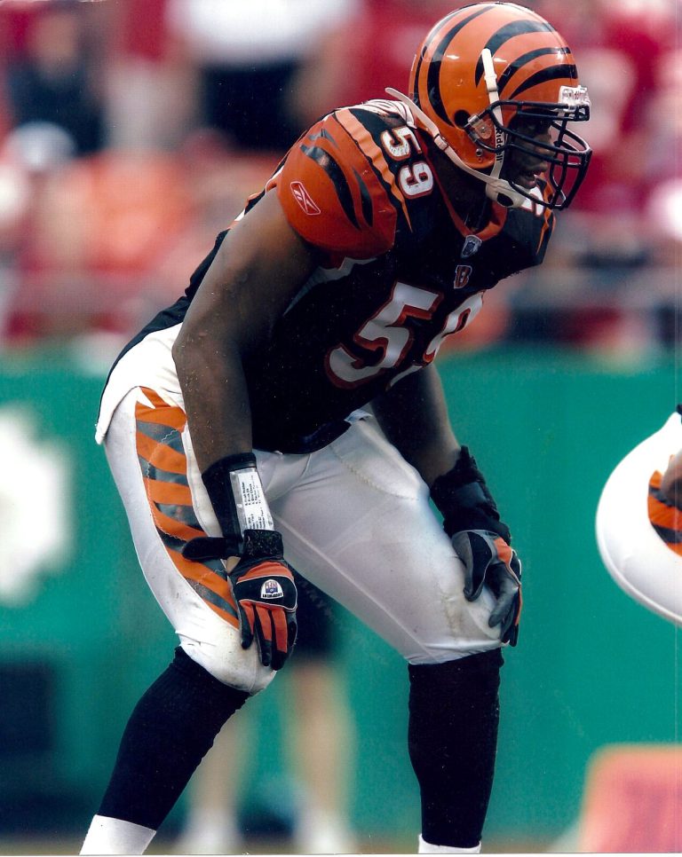 Landon Johnson in a Bengals No. 59 uniform in a ready stance