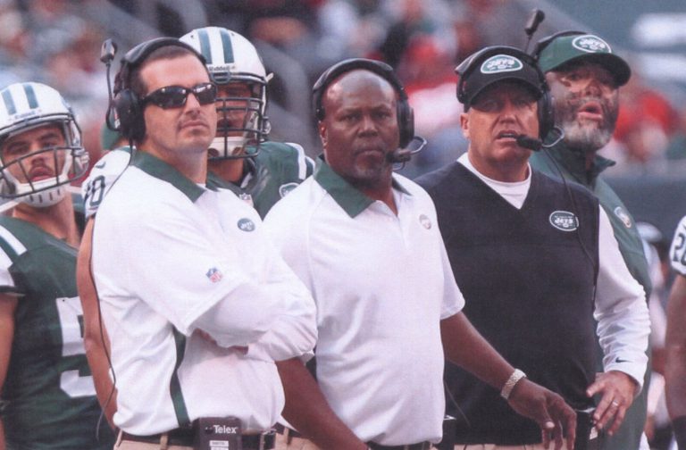 New York Jets coaches and players in headsets along the sideline, from the Mike Smith collection
