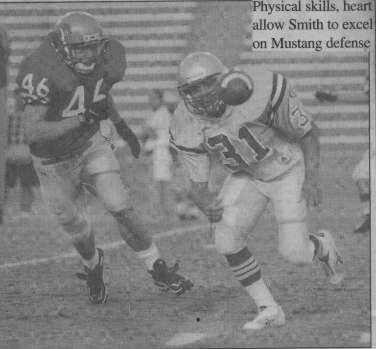 Coronado linebacker Mike Smith, number 46, closing in on a Carlsbad, N.M., receiver, from a newspaper photo