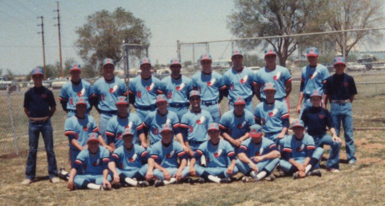 Baseball team in powder-blue uniforms posed outdoors, from the Steve Coleman collection