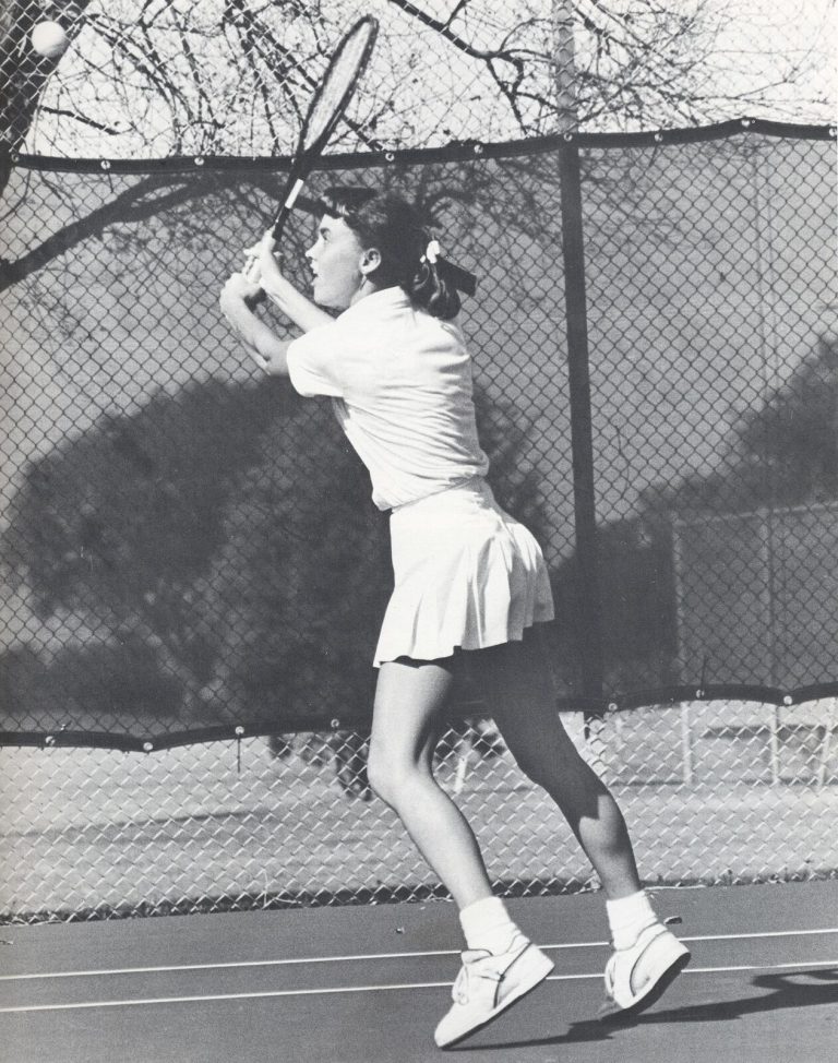 Tanya Hamilton Bryant and Lara Mahaney: a player winding up for an overhead serve, black and white