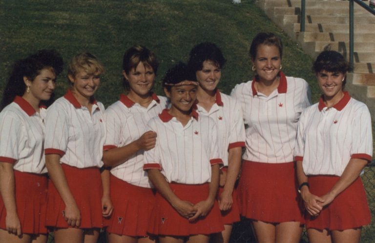 Tanya Hamilton Bryant and Lara Mahaney's Coronado girls tennis team posing in red and white outfits