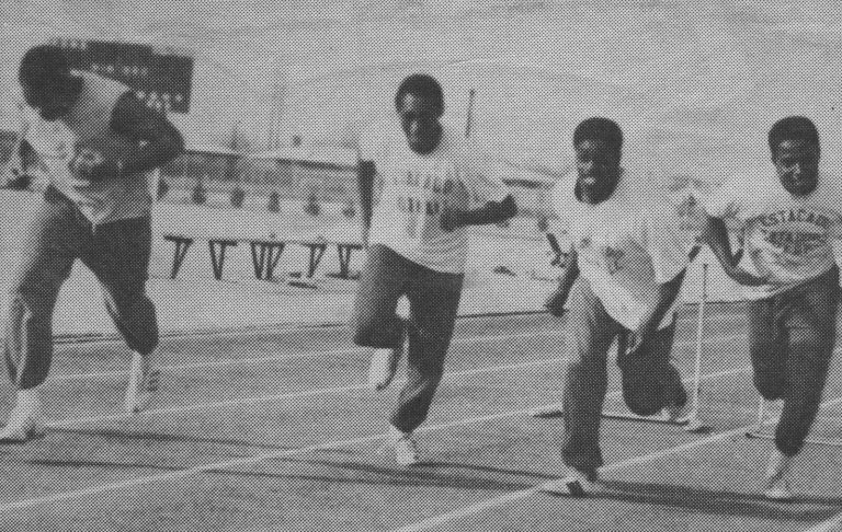 1970 State Champion Track Team relay runners racing to a record at the Plainview Invitational, from a 1970 newspaper