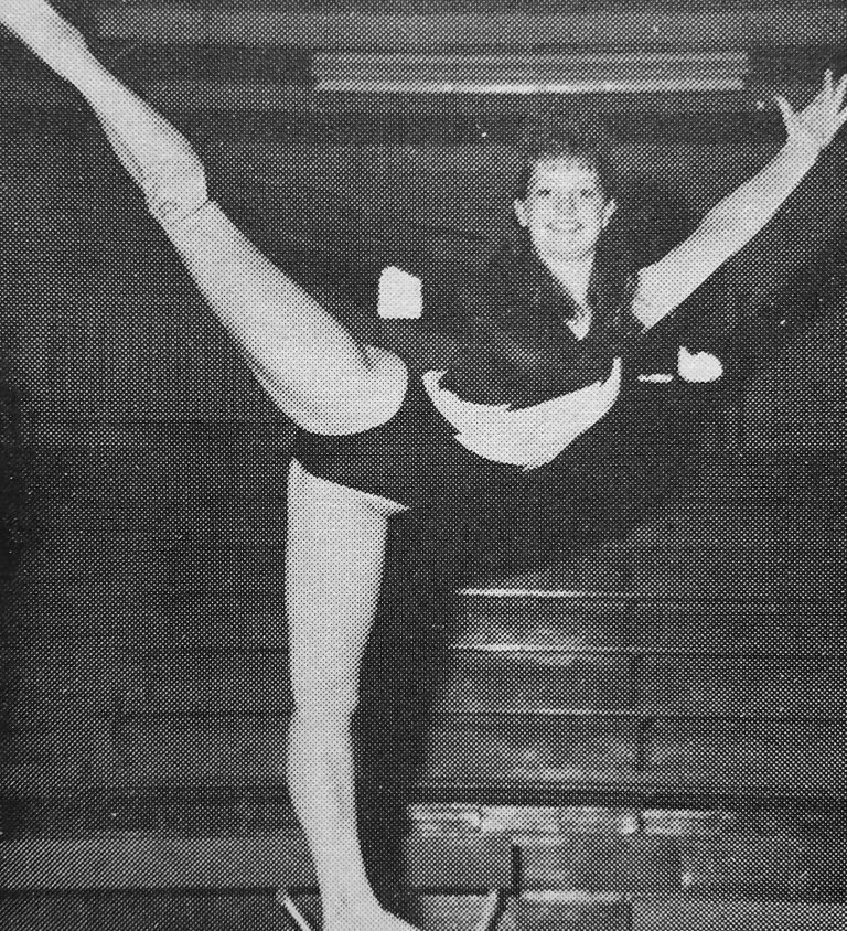 1989–90 and 1990–91 State Champion Gymnastics Teams: gymnast in a high leg kick with arms outstretched, black and white
