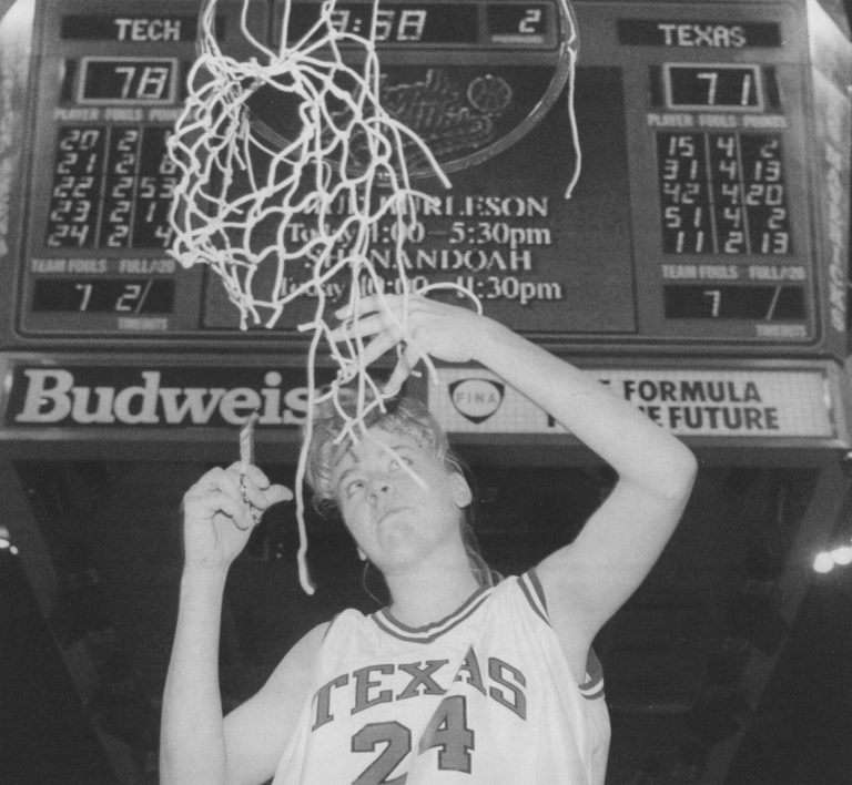Janice Farris Legan: Texas Tech player cutting down the net after a 78-71 win over Texas, black and white