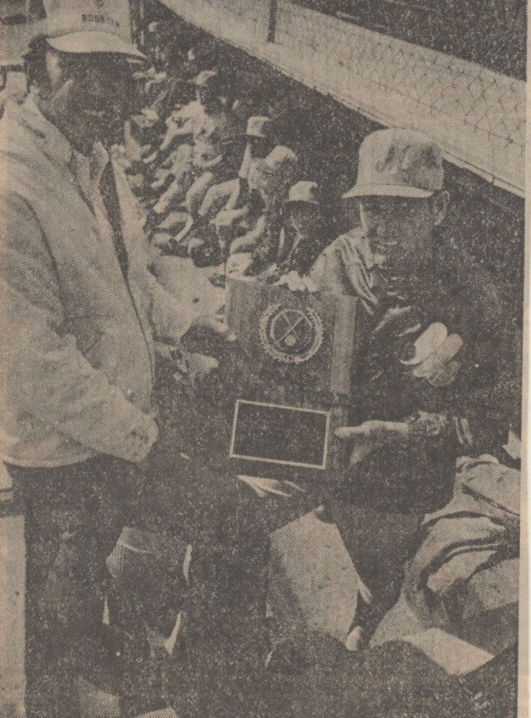 1981 State Champion Baseball Team coach Bobby Moegle accepting a plaque marking 600 career wins from booster Ray Coleman