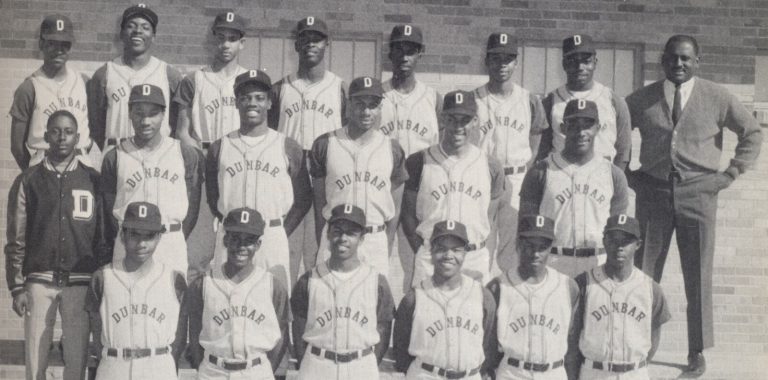 Dunbar baseball team and coach posed outside in a yearbook team photo, from the Ronald “Bubba” Kinner collection