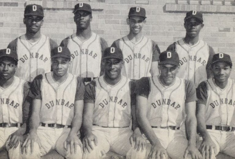 Dunbar baseball squad in two rows against a brick wall, a closer team shot from the Ronald “Bubba” Kinner collection