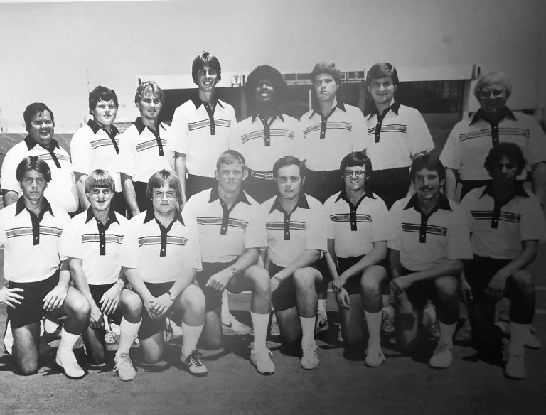 Texas Tech athletic training staff posed in two rows in a black-and-white group photo from the Anthony Peppers collection