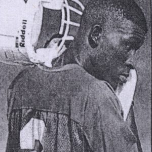 Taje Allen in profile with his Riddell helmet pushed back at a Texas Longhorns practice.