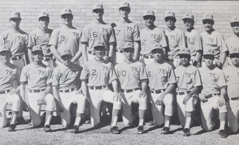 Monterey baseball team kneeling and standing in front of a brick wall, black-and-white photo from the Tim Leslie collection