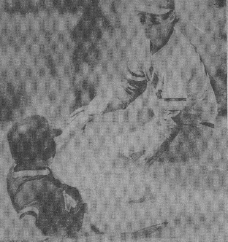 1974 Monterey State Champion Baseball Team player Bobby Evans sliding into second base, from a newspaper clipping
